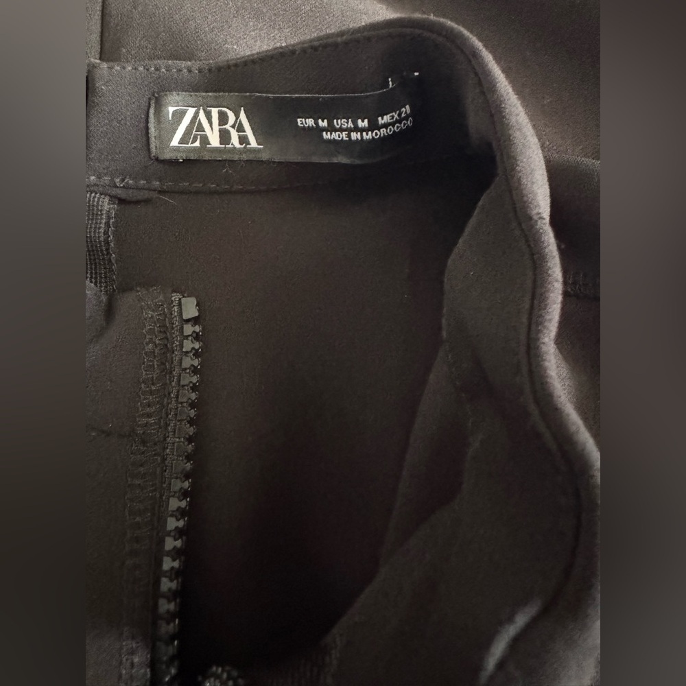 Zara Zip-Front Dress Black Solid
Sleeveless Sheath Front Slit Stretch
Size M - Picture 7 of 15